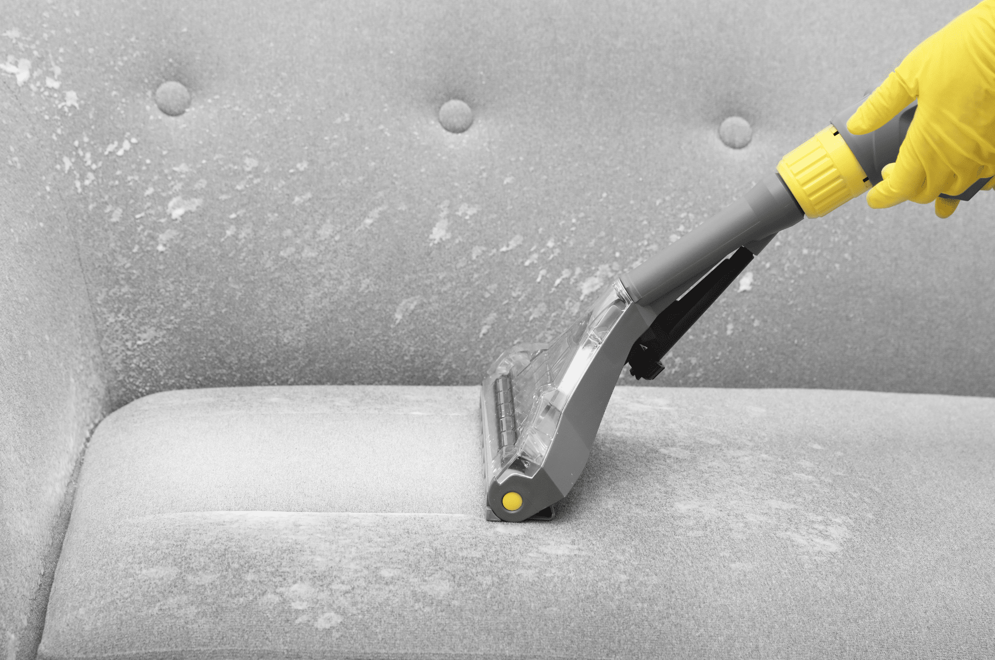 7 Cleaning a couch with a vacuum