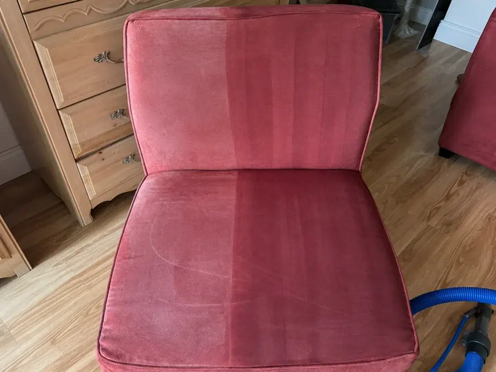 Upholstered chair showing the clean half next to the dirty half